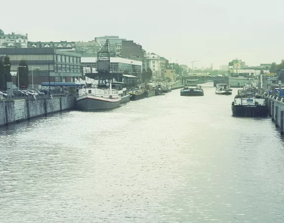 Brussels canal with moored boats at Avenue du Port