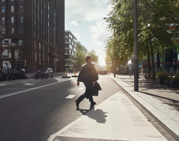 Amsterdam Zuidas man walking